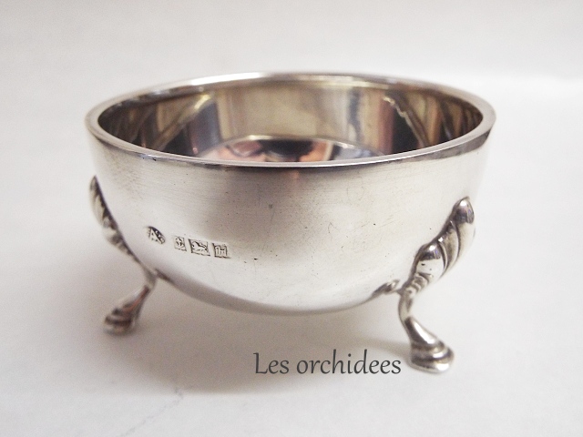 silver tea strainer with saucer